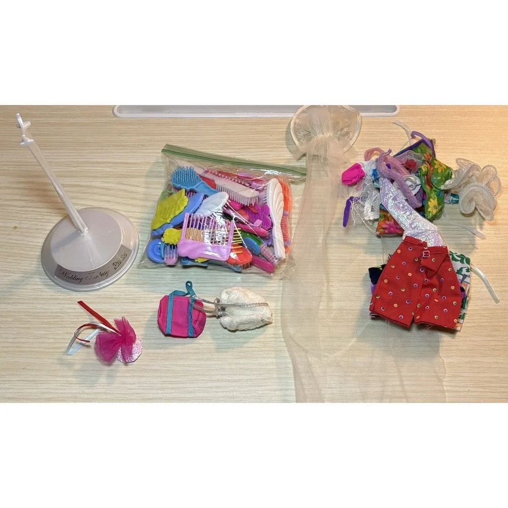 Vintage 80s Barbie lot Including Clothes, Accessories And A Case